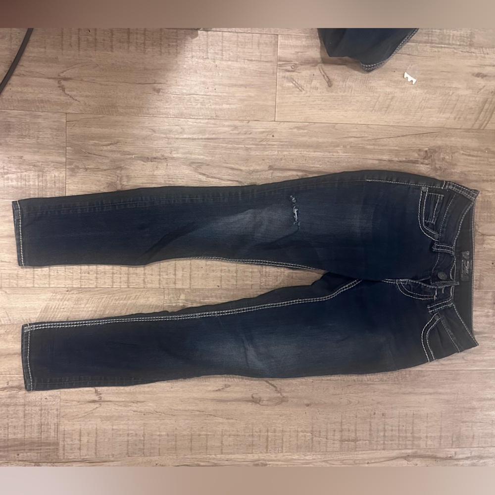 Women’s silver jeans. Size 26 waist 31 long.